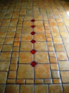Concrete tile made then stained and installed by homeowner Larry Bodenhamer.