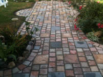 Cobblestone Concrete Pavers made and installed by homeowner Kevin Brandon.
